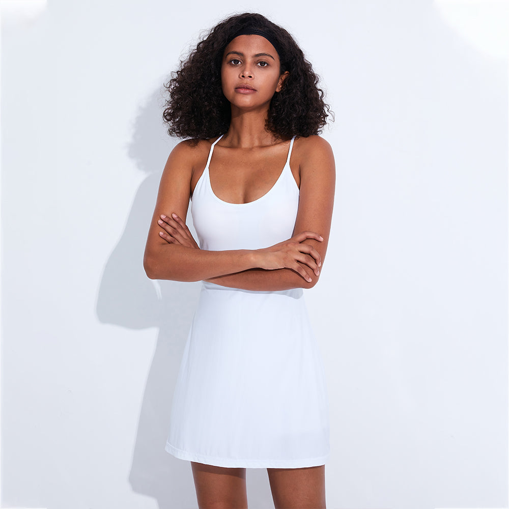 This 2-In-1 Women's Slim Y Back Padded Tennis Dress & Shorts offers the ultimate comfort and keeps you cool during those intense tennis matches. Its ultra flexible and can stretch to enable you to reach those tricky low balls and execute offense when under pressure.